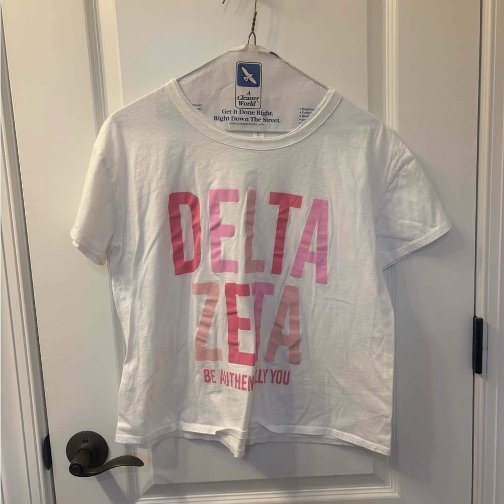 White Delta Zeta T-Shirt with Pink Lettering